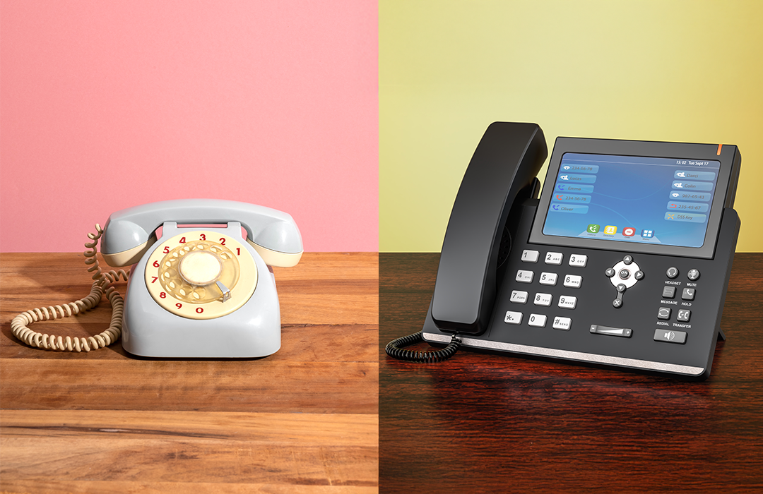 Side-by-side image of a rotary landline phone and a modern VoIP office phone, showing the shift businesses make with an Albuquerque phone system installer